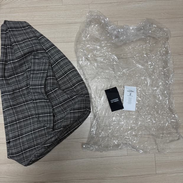 라프시몬스 이스트팩 슬링백 체크