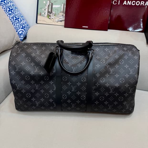 루이비통 모노그램 반둘리에 키폴 55 토트 보스턴백 