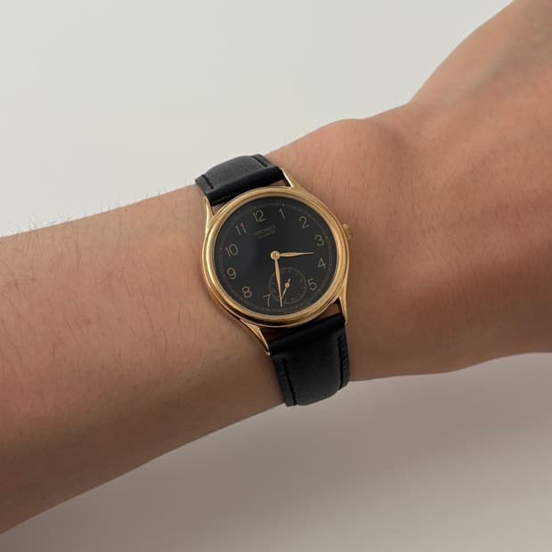 80s black dial small seconds gold quartz