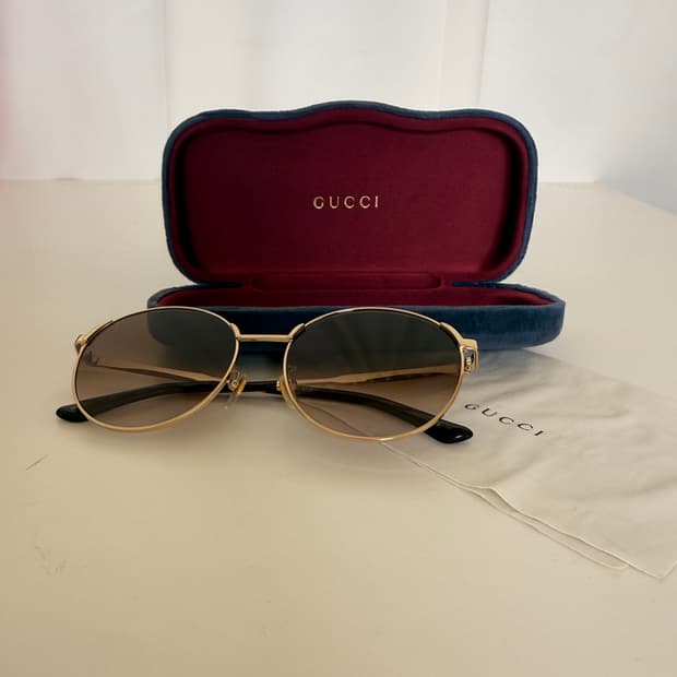 구찌(Gucci)의 GG0206SK 라운드 메탈 선글라스