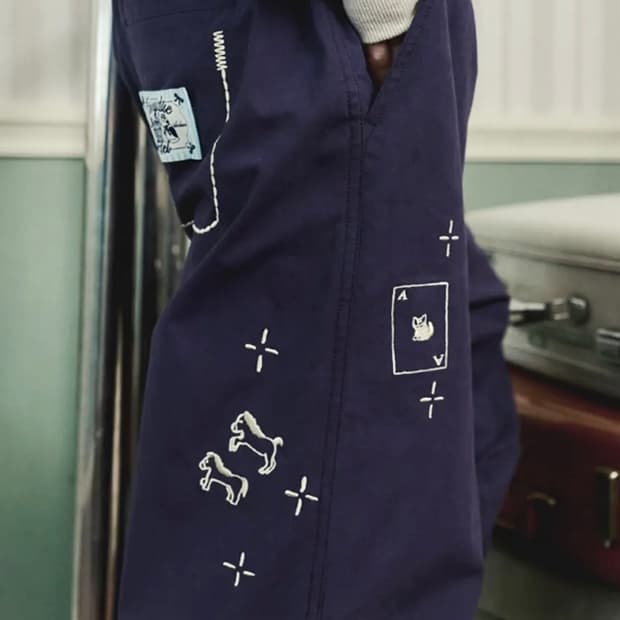 론론 DRAWING STITCH PARACHUTE PANTS - NAVY