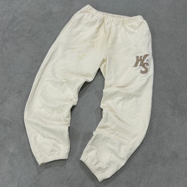 위캔더스 아이보리 로고 트레이닝 바지 m