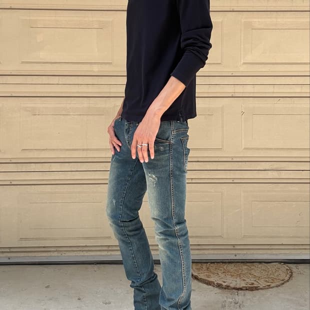 00s metal plate logo slim straight jeans