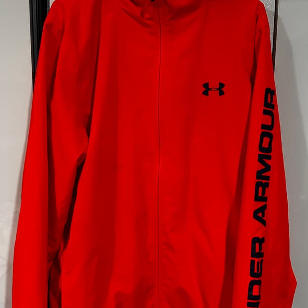 언더아머 오렌지 바람막이 L