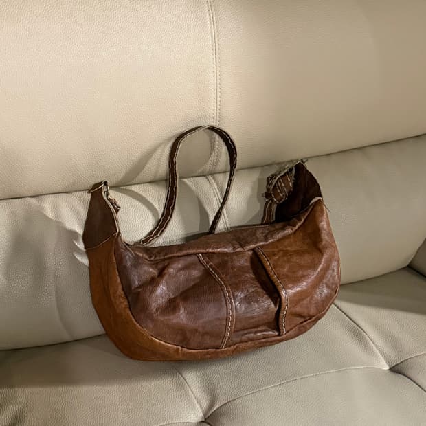 Distressed real leather crescent bag