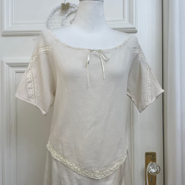 ivory ballerina lace trim bow span top