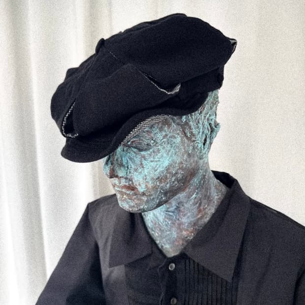 Moseori SLASHED REVERSIBLE NEWSBOY