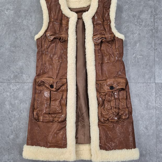 NELL BARRETT 레더조끼