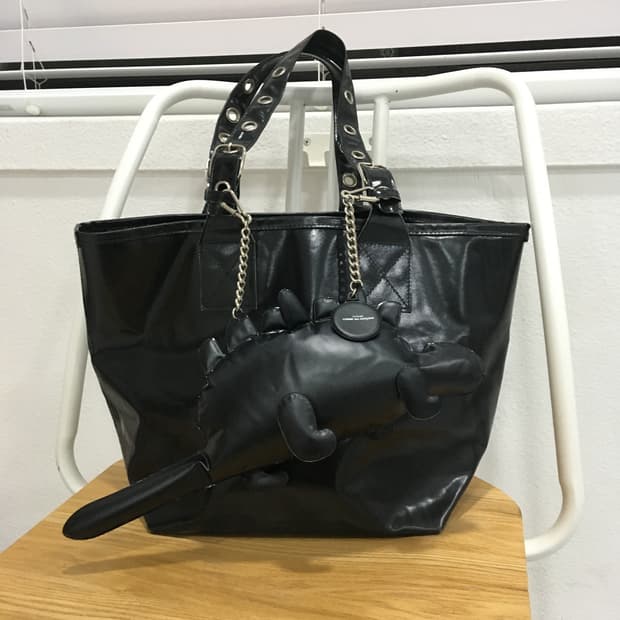comme des garcons dinosaur bag