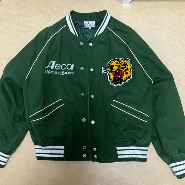 에이카 바시티 자켓