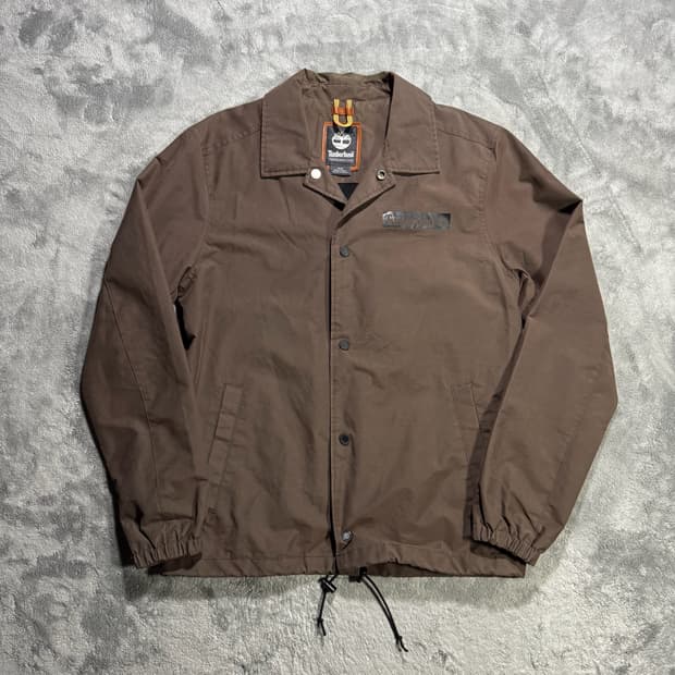 팀버랜드 브라운 백프린팅 코치자켓