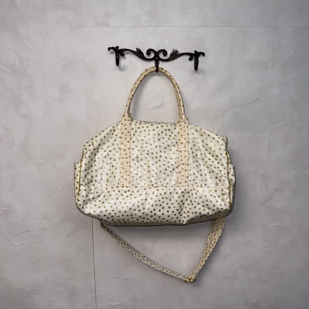 Ivory gold dot two way boston bag
