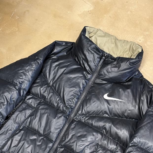 M 나이키 우먼스 스테이트먼트 다운 필 숏 패딩