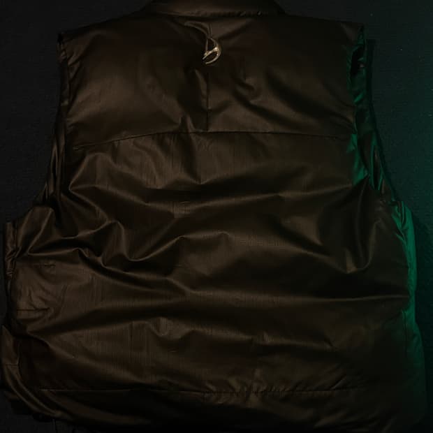 디서먼트 패딩 조끼