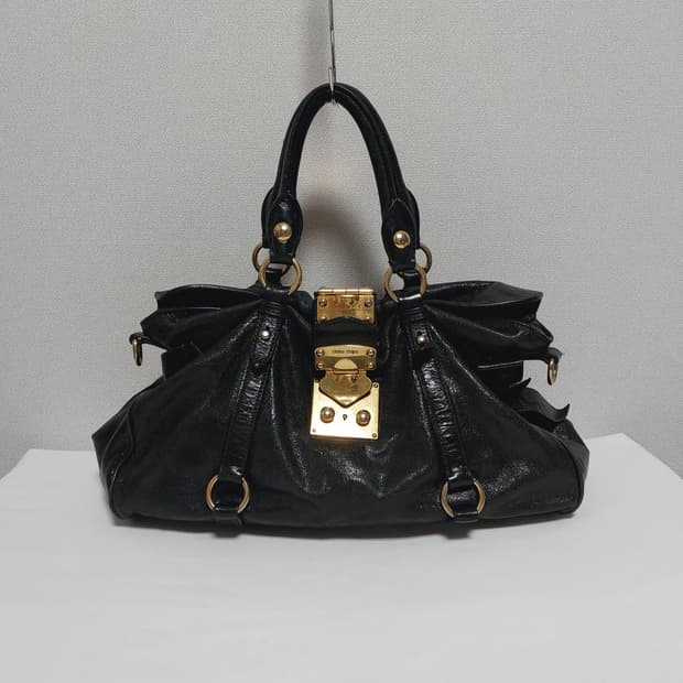 미우미우 비텔로 럭스 레더 금장 버클 리본 사첼백 (정품)