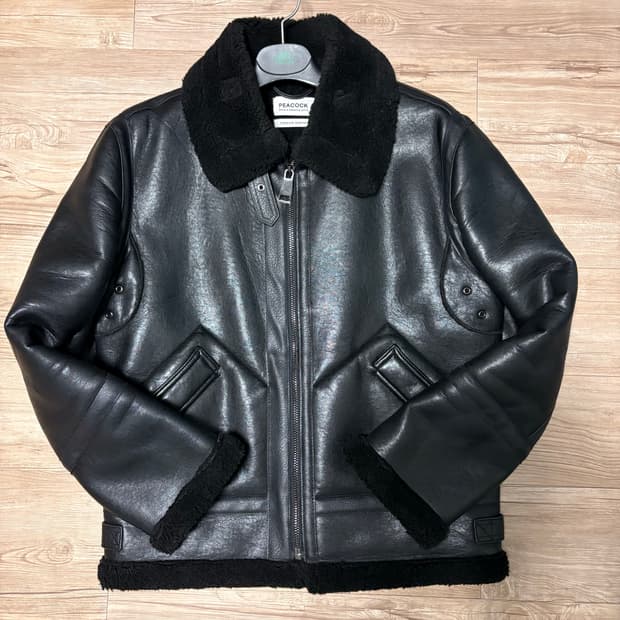 피코크 블랙 카우레더 무스탕