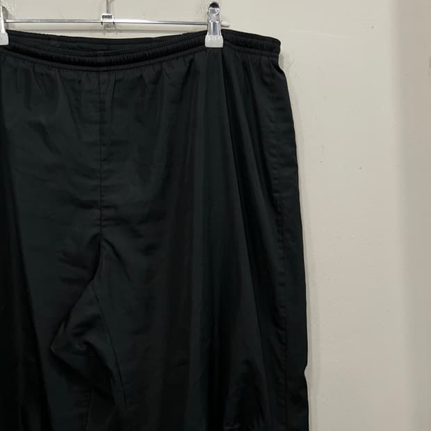나이키 스톰핏 사이드 지퍼 밴딩 트랙팬츠