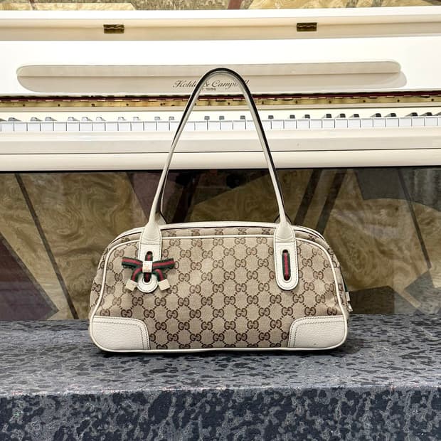 구찌 GG 캔버스 프린시 리본 바게트백