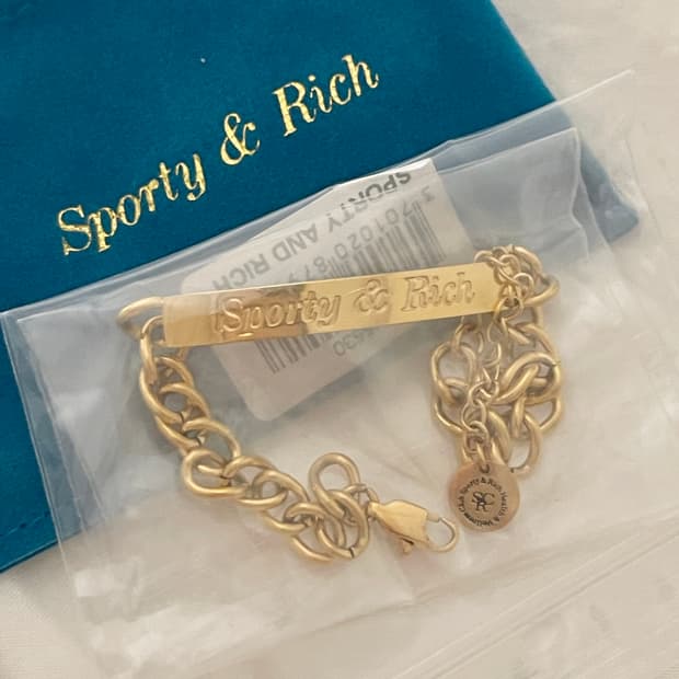 (새상품)Sporty & Rich 스포티앤리치 로고 커브 골드 체인 팔찌