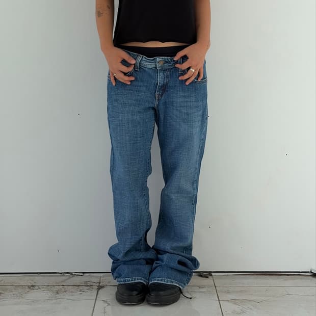 Levi’s 518 Superlow 빈티지 워싱 부츠컷 데님 팬츠