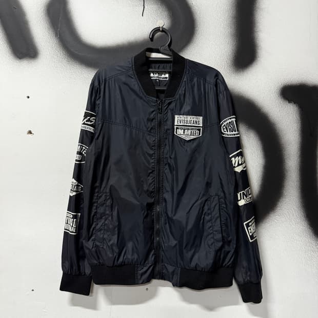Evisu 에비수 올드스쿨 멀티 프린팅 우븐 집업 바시티 자켓