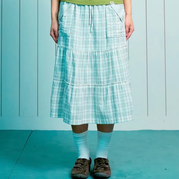 더콜디스트모먼트 TCM frill pocket check skirt