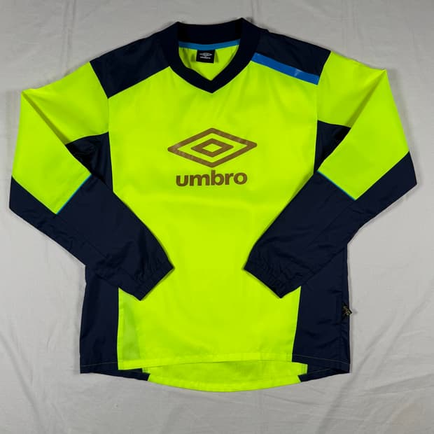 엄브로 바람막이 웜업 피스테