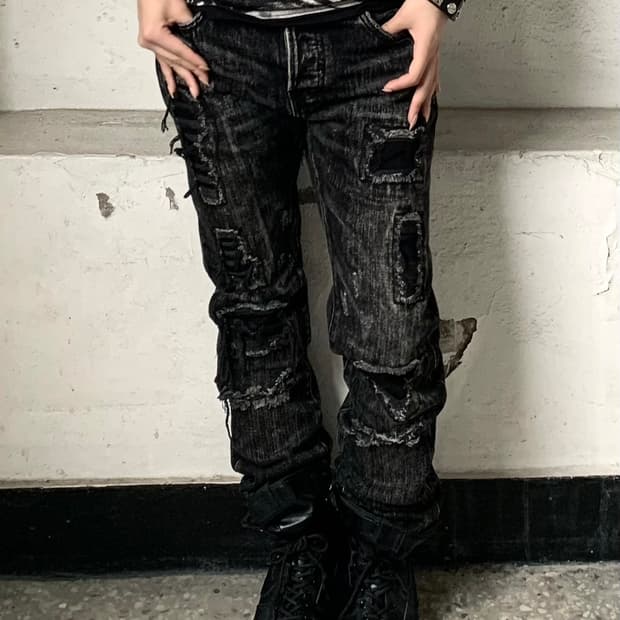 Crack washed damaged pants