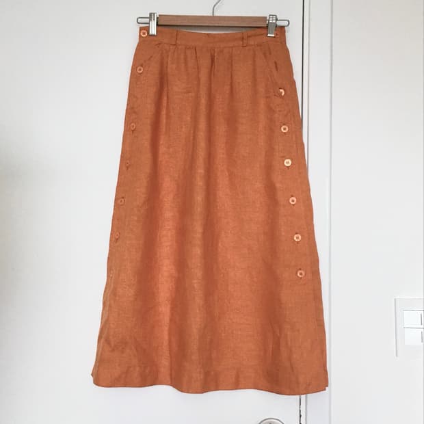 burnt orange linen button skirt
