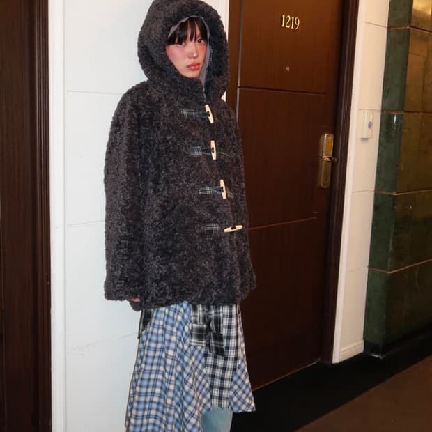 The museum visitor fur jacket