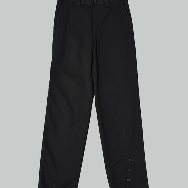 언더커버리즘 밑단 버튼 팬츠