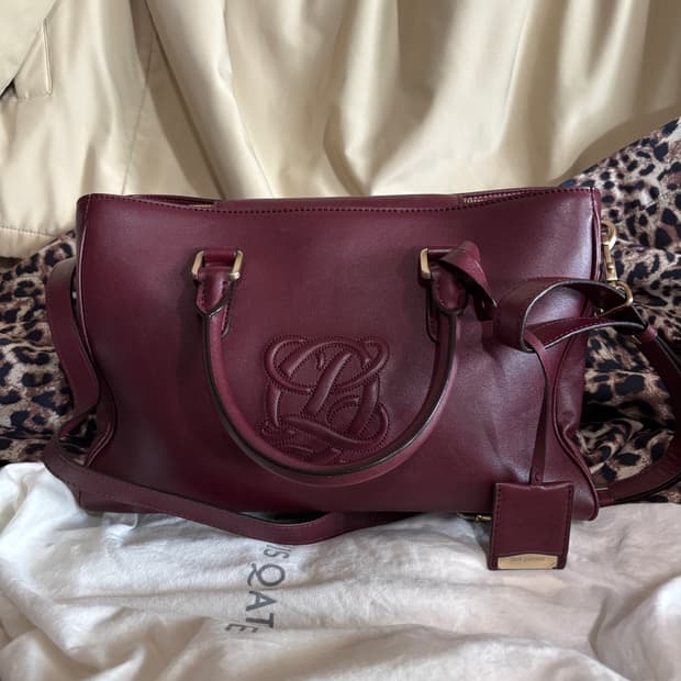 vintage louis quatorez wine leather bag