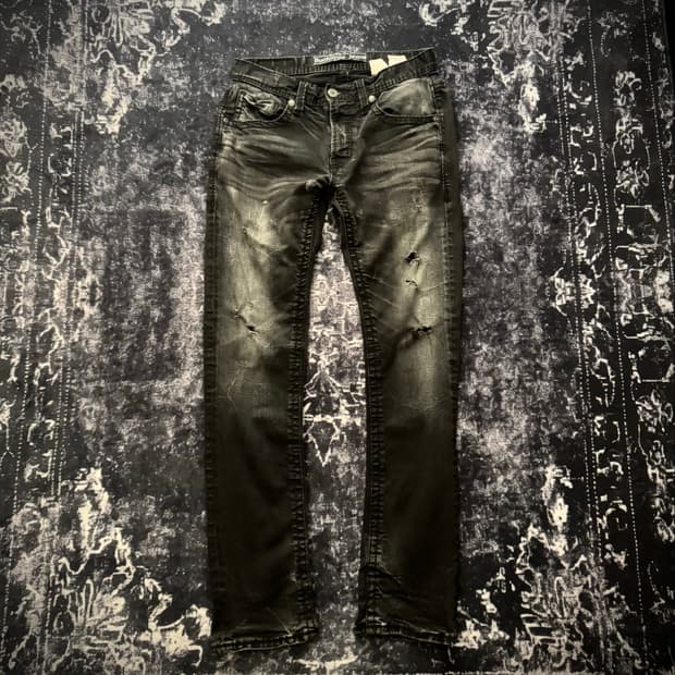 “BUCKAROO” black damaged denim pants 