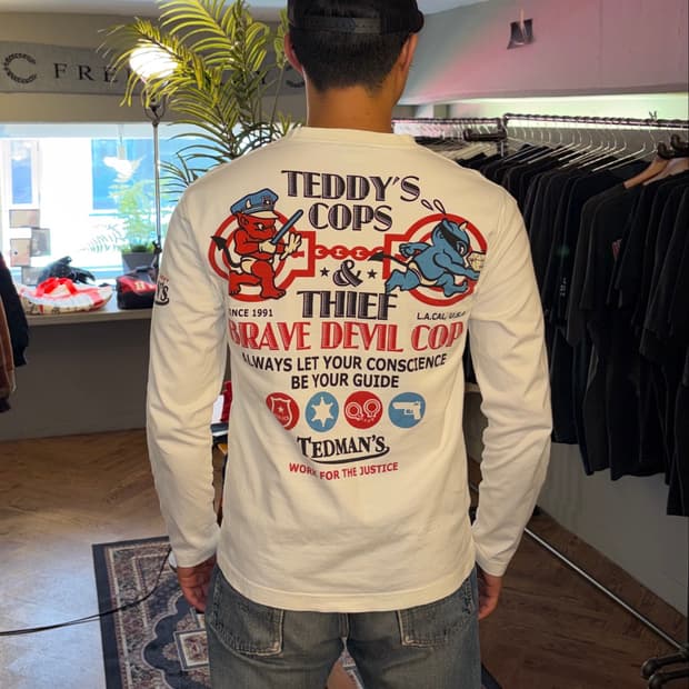 Ted Company Ted’s cops/thief sleeve