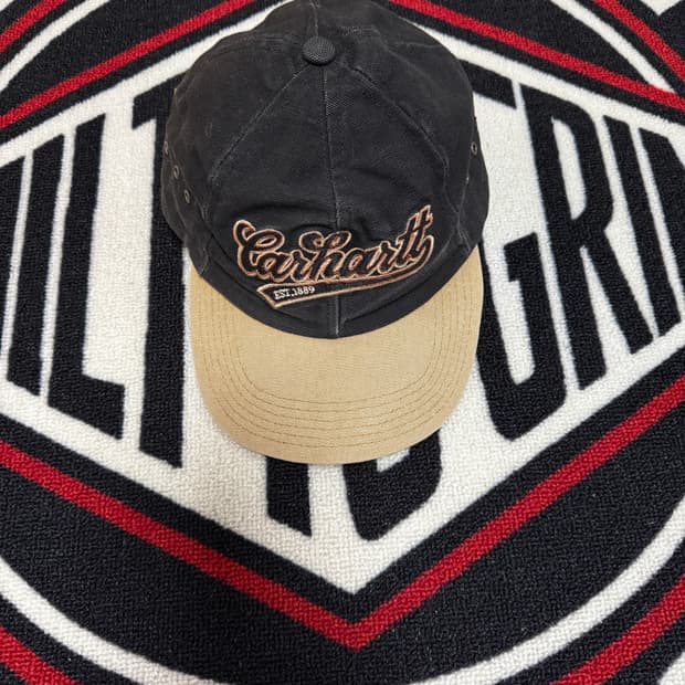 칼하트 레더 스트랩 백 캔버스 캡 블랙