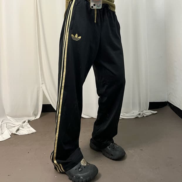 Adidas black gold Firebird track pants