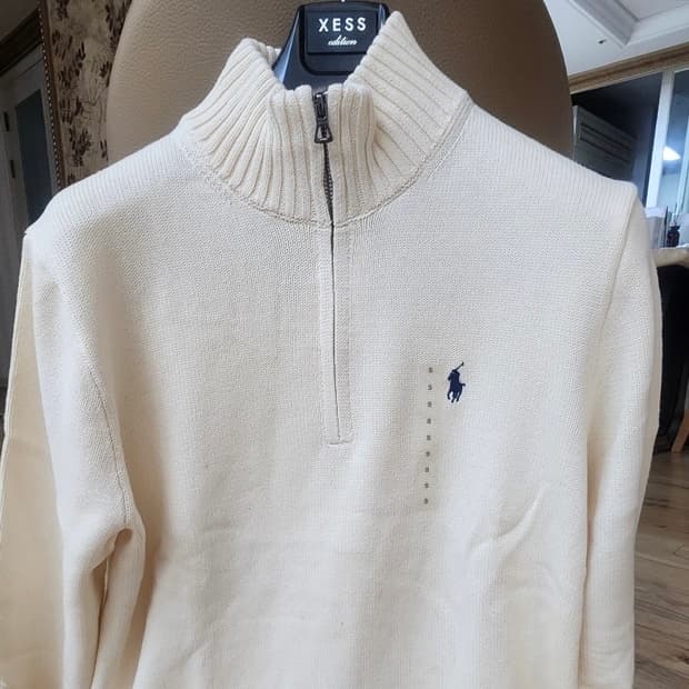 폴로 반집업 니트