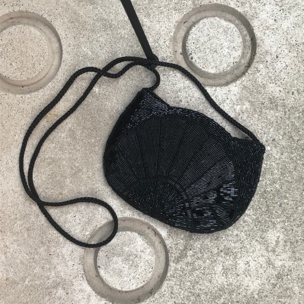 black shell beaded pouch bag