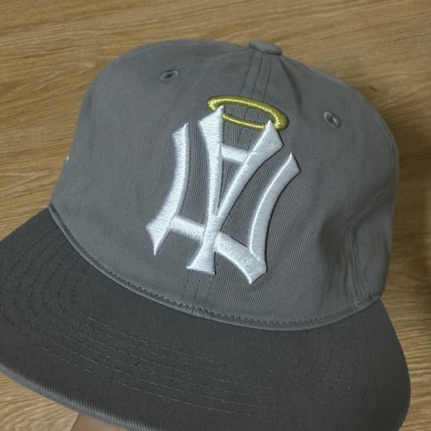 Aeae symbol angel wing cap