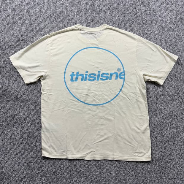 디스이즈네버댓 빅로고 아이보리 티셔츠