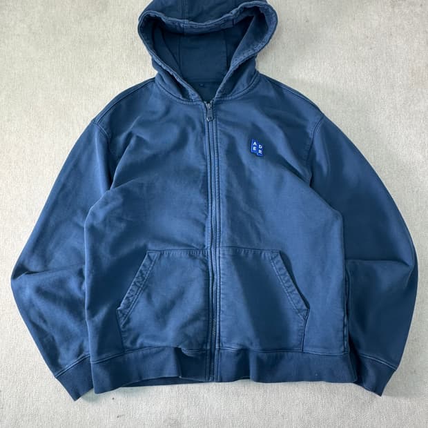 100 아더에러 네이비 후드집업