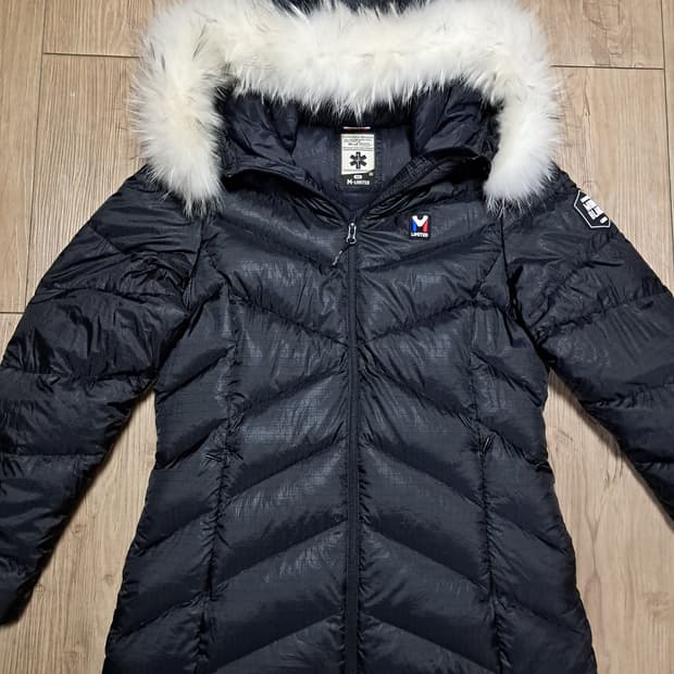 밀레 여성 패딩 100