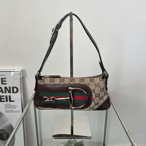 구찌 모노그램 해슬러 포쉐트