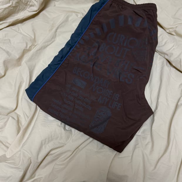 [L] 테켓 징글 월드 트랙팬츠 브라운