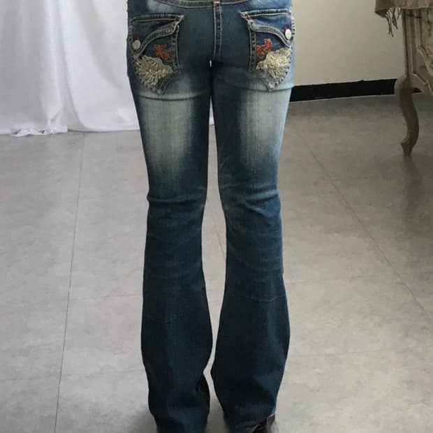 Back wing point denim pants