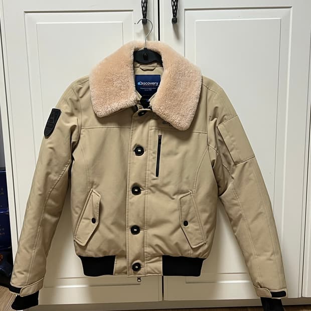 디스커버리 거위솜털 패딩 