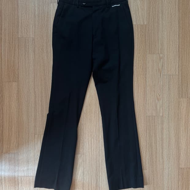 구민성 flared cut pants in wool gabardine
