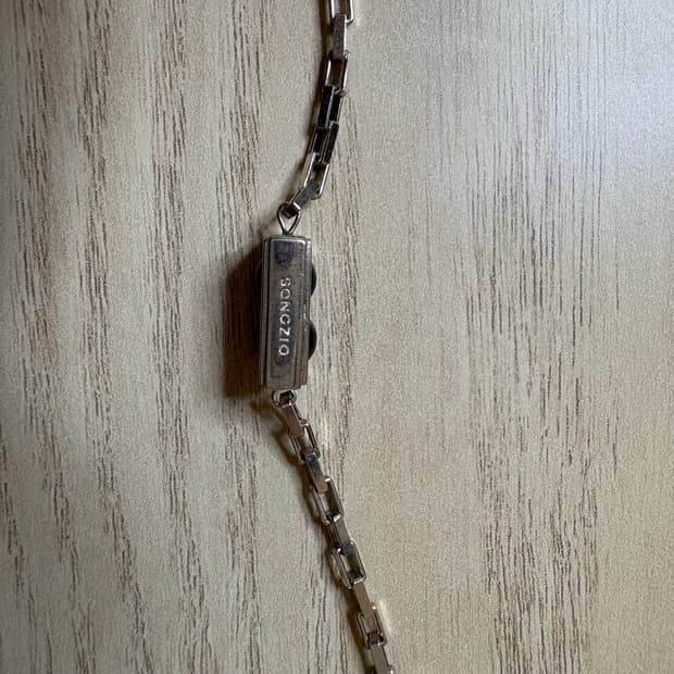 송지오 24SS 컬렉션 블랙 아이즈 프레임 팔찌 남성용