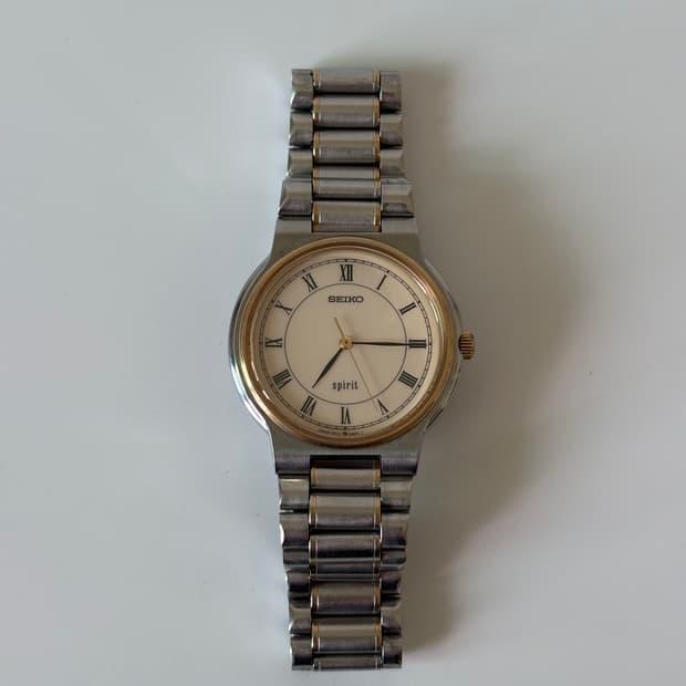 1980s Spirit Roman Gold Bezel Quartz