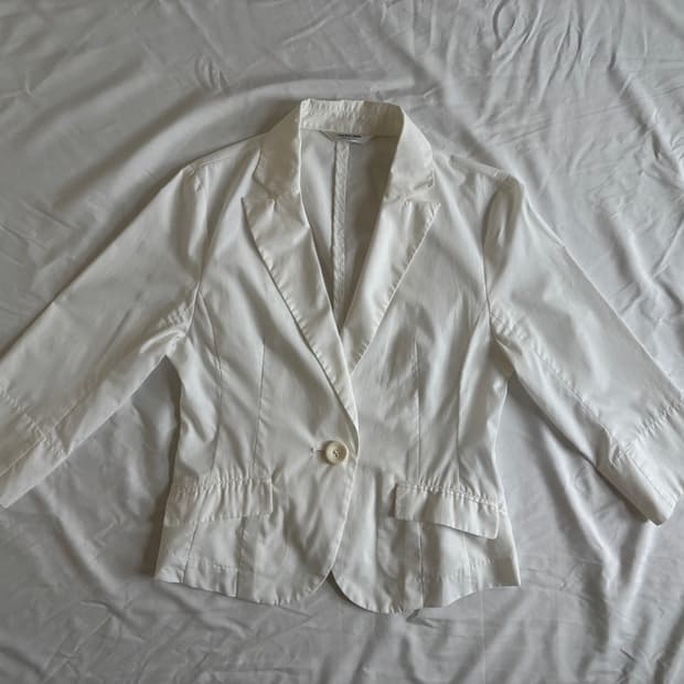 white jacket, back ruffle detail